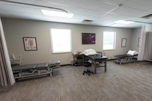 Large room with medical beds and equipment